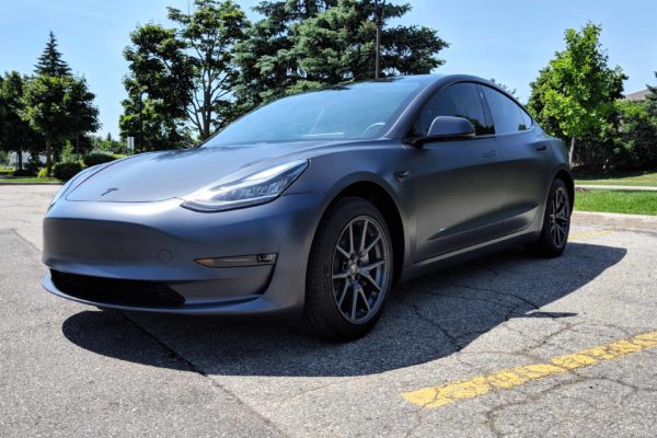 Tesla Model 3 Xpel paint protection film wrap with gloss black chrome delete