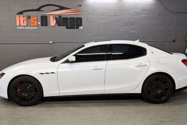 Maserati Ghalib wrap Avery satin white with charcoal chrome delete